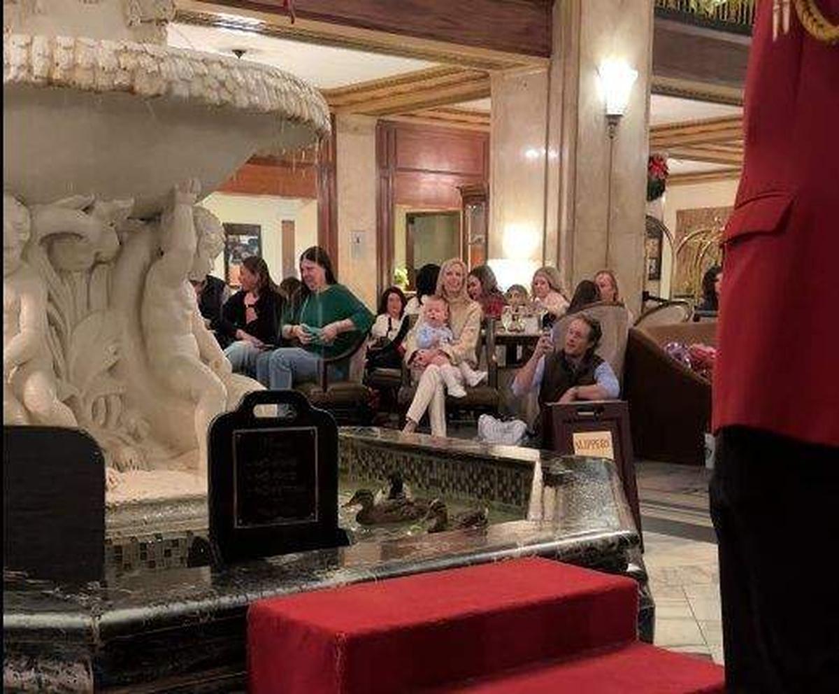  The ducks glide in the lobby fountain as the crowd gathers around. Photo credit: Robin O’Neal Smith 