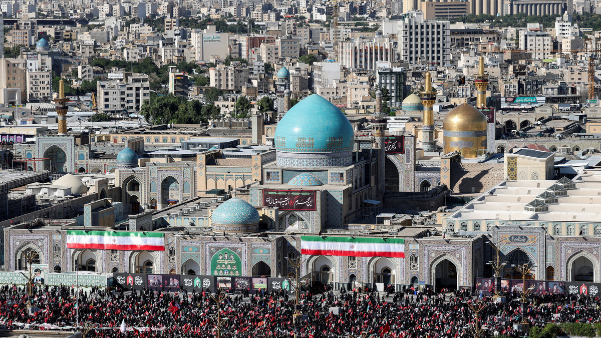 Mourners gather by Imam Reza shrine, on the day of of the burial of Iran's late Supreme Leader Ayatollah Ali Khamenei, who was killed on February 28 in Israeli and U.S. airstrikes, in a culmination of a mass funeral, in Mashhad, Iran, July 9, 2026. REUTERS/Mohammed Salem