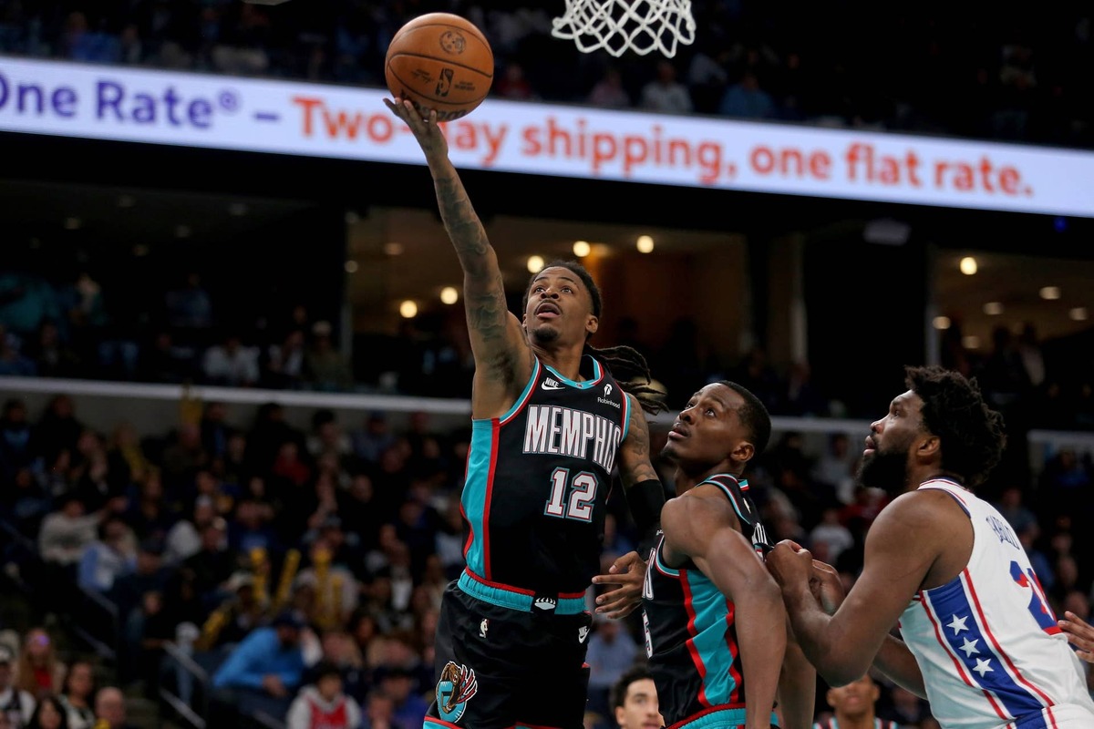  Dec 30, 2025; Memphis, Tennessee, USA; Memphis Grizzlies guard Ja Morant (12) shoots during the fourth quarter against the Philadelphia 76ers at FedExForum. Mandatory Credit: Petre Thomas-Imagn Images 