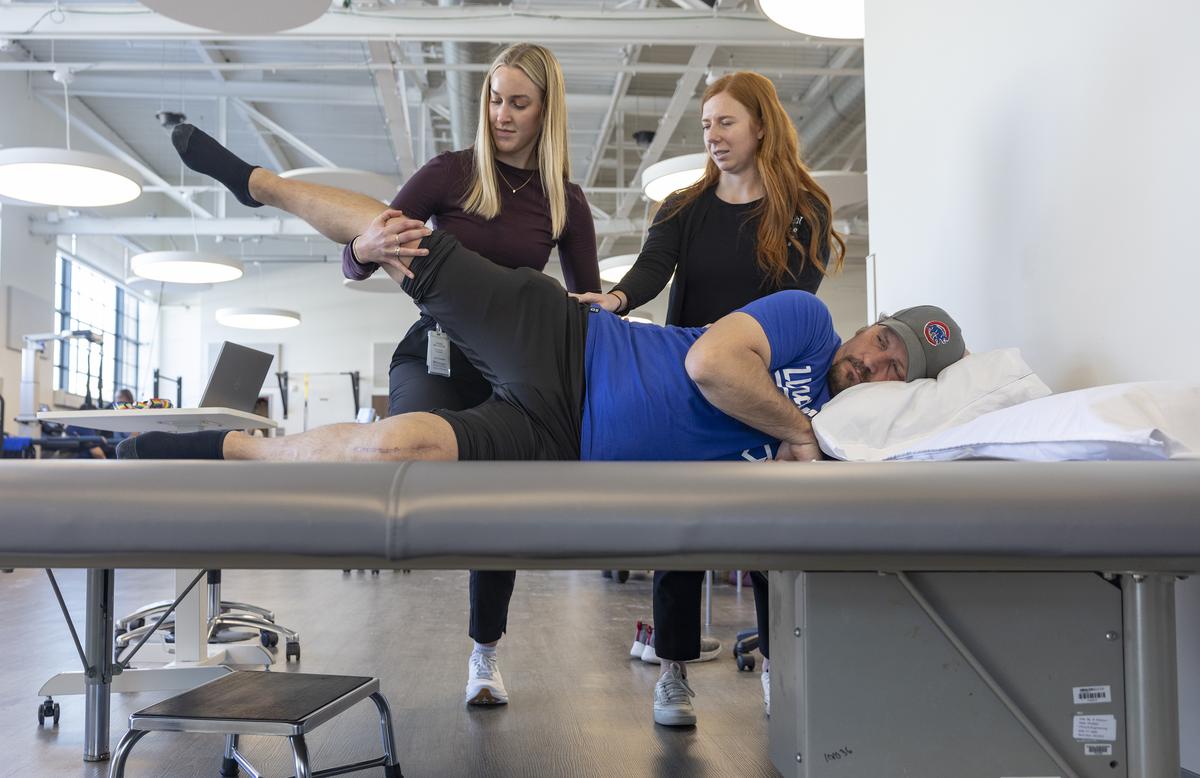 Rickey Malloy, who was diagnosed with ALS in July 2023, was deemed healthy enough to get a knee replacement last year and is part of a physical therapy clinical trial at WashU Medicine in St. Louis, on Jan. 27, 2026. The drug, tofersen, made by Biogen and marketed as Qalsody, is for a small subset of patients. But evidence that breathing and strength can get better for some of them is remarkable for a paralyzing, usually fatal disease. (Julia Rendleman/The New York Times)