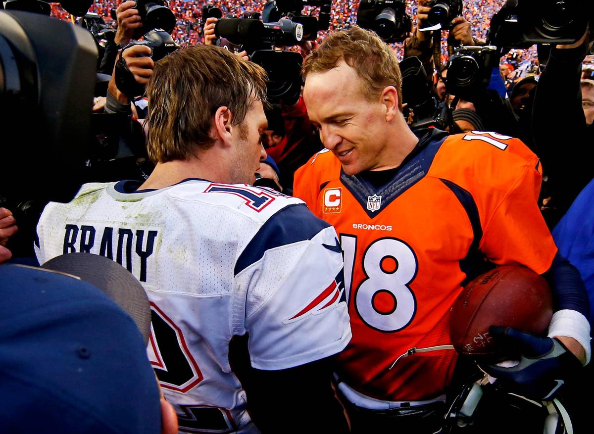  Jan 24, 2016; Denver, CO, USA; New England Patriots quarterback Tom Brady (12) and Denver Broncos quarterback Peyton Manning (18) shake hands and speak after the game in the AFC Championship football game at Sports Authority Field at Mile High. Mandatory Credit: Kevin Jairaj-USA TODAY Sports 