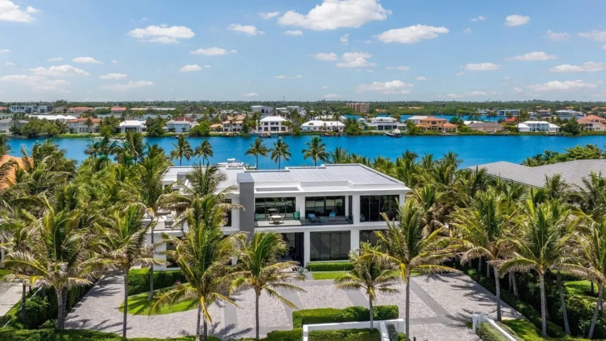 The estate at 1660 S. Ocean Blvd. in Manalapan has 150 feet of frontage on the Intracoastal Waterway, seen at the rear, and the same amount on its beach parcel.