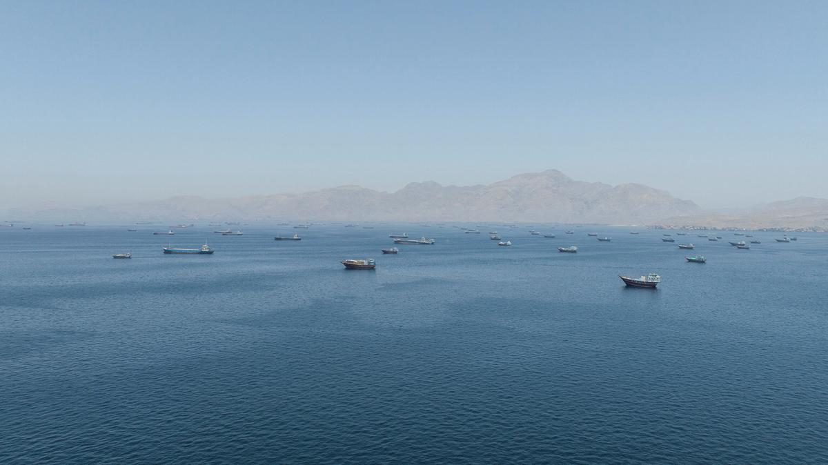 A drone view shows vessels sailing through the Strait of Hormuz, as seen from Musandam, Oman, May 25, 2026. REUTERS/Stringer