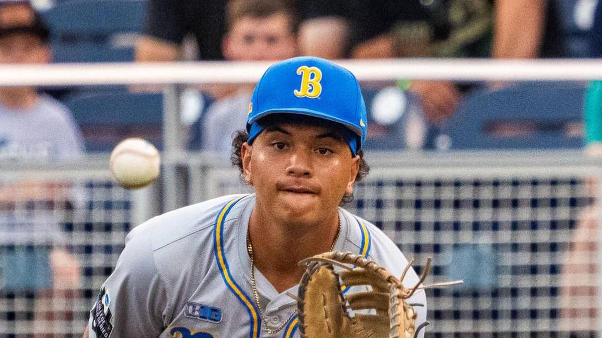  Jun 17, 2025; Omaha, Neb, USA; UCLA Bruins first baseman Mulivai Levu (39) catches for an out against the Arkansas Razorbacks during the first inning at Charles Schwab Field. Mandatory Credit: Dylan Widger-Imagn Images | Dylan Widger-Imagn Images 