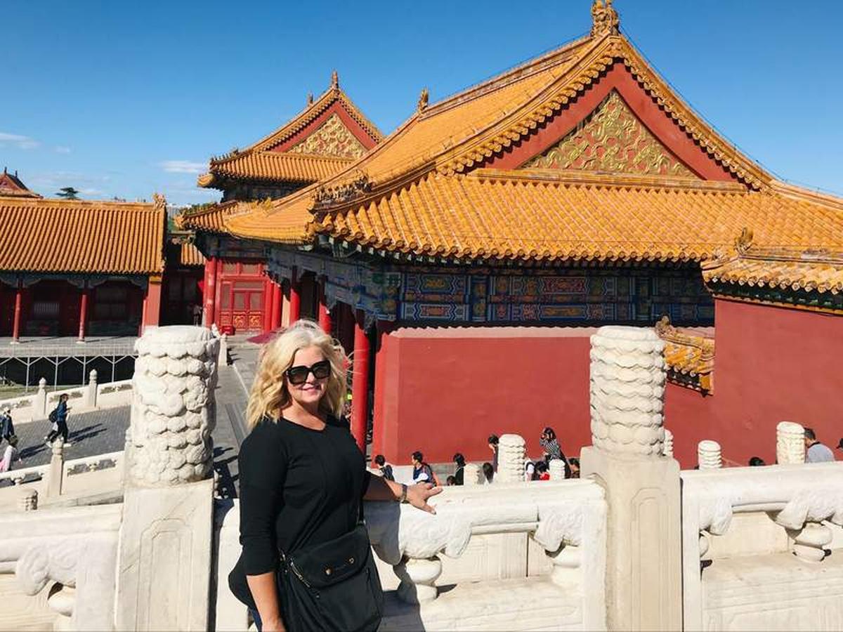  Walking through the Forbidden City in Beijing while embracing a slower travel pace. Photo credit: Shelly Peterson 