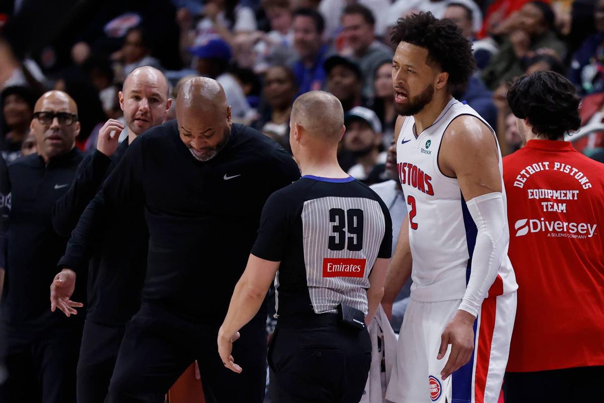  Detroit Pistons head coach J.B. Bickerstaff and guard Cade Cunningham (2) talk to referee Tyler Ford during game two of the first round of the 2026 NBA Playoffs 
