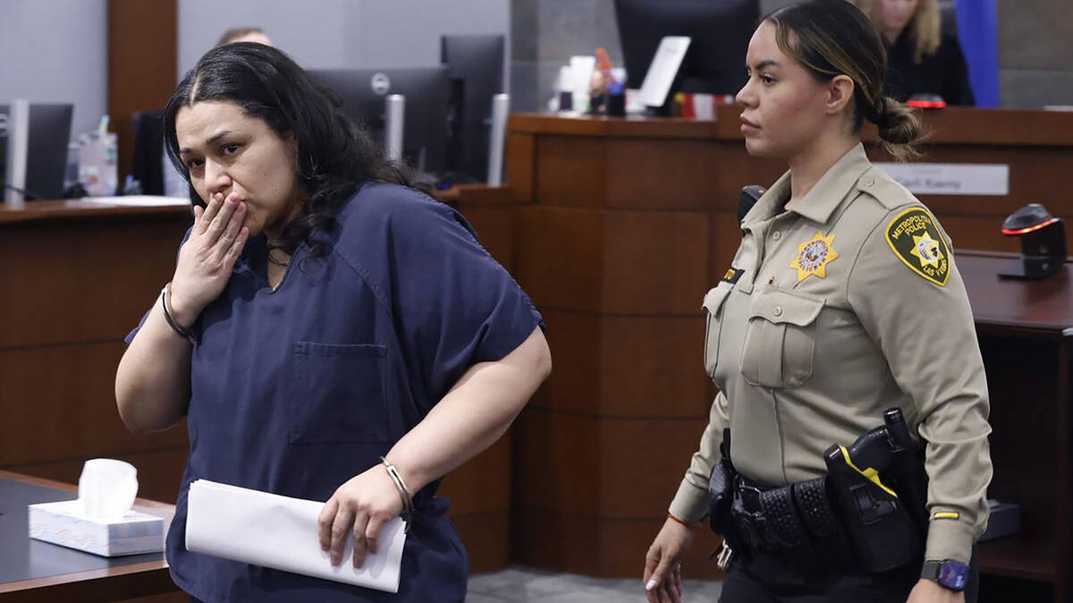 Jovan Trevino, who pleaded guilty to two counts of first-degree murder, one for each of her children, blows a kiss to her brothers, who came to deliver their victim impact statements, as she is led out of a courtroom after her sentencing at the Regional Justice Center, on Tuesday, May 12, 2026, in Las Vegas. (Bizuayehu Tesfaye/Las Vegas Review-Journal/TNS)