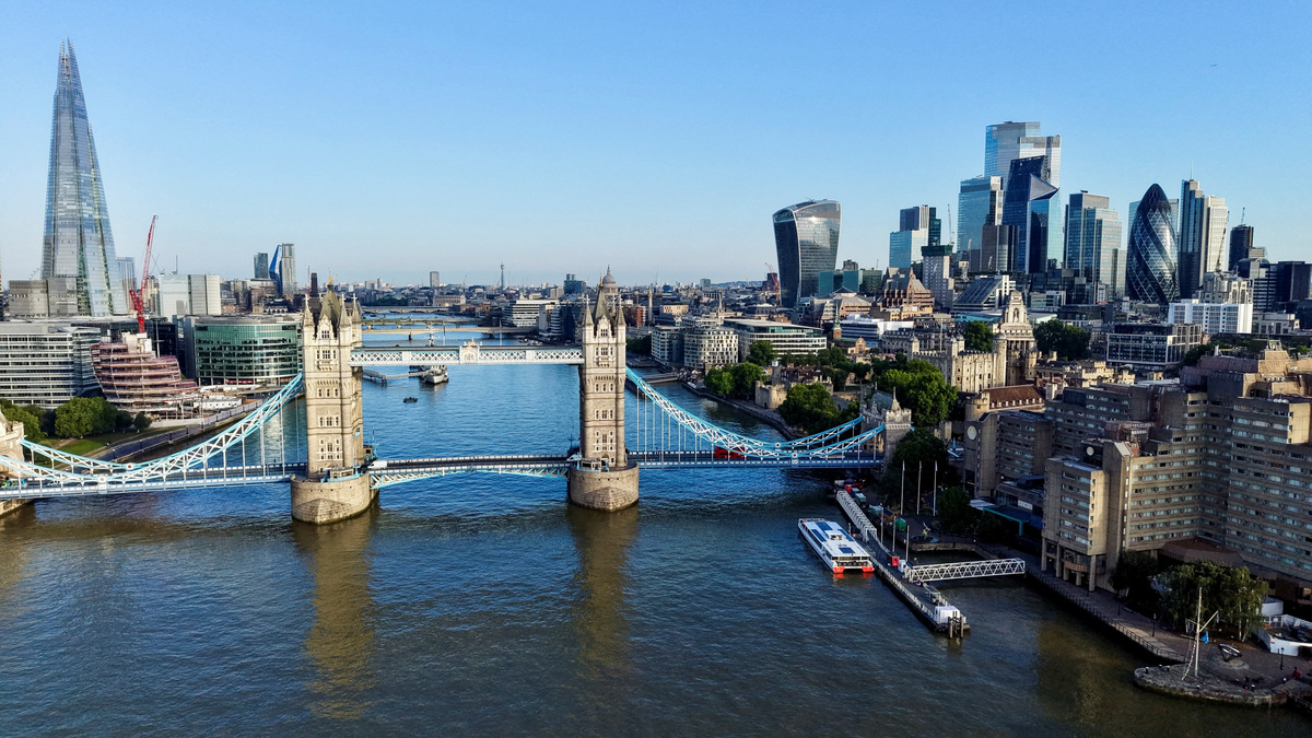 A drone view shows the skyline above central London at sunrise, Britain June 19, 2026. REUTERS/Yann Tessier