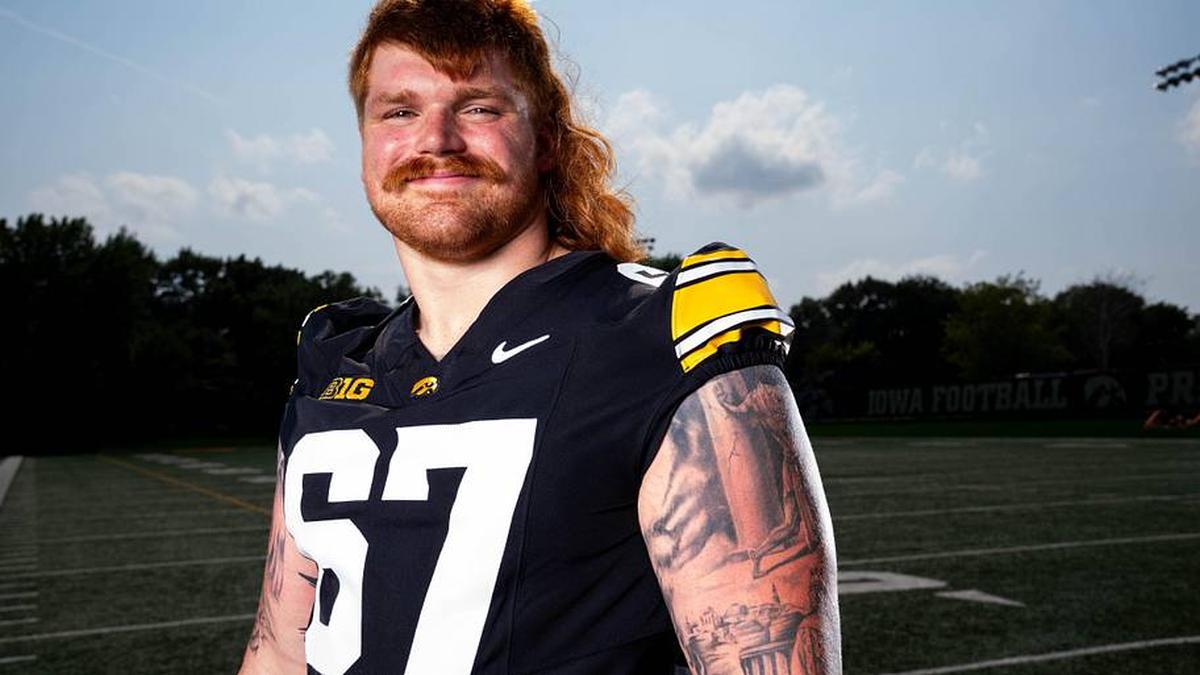 Offensive Lineman Gennings Dunker stands for a photo as Iowa Football hosts media day on Aug. 8, 2025, in Iowa City. | Cody Scanlan/The Register / USA TODAY NETWORK via Imagn Images 