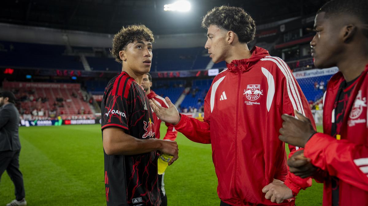 Adri Mehmeti, right, and Julian Hall, of the New York Red Bulls, speak after a game against D.C. United on April 23, 2026. The goal for most promising young American players is to play for a European club.