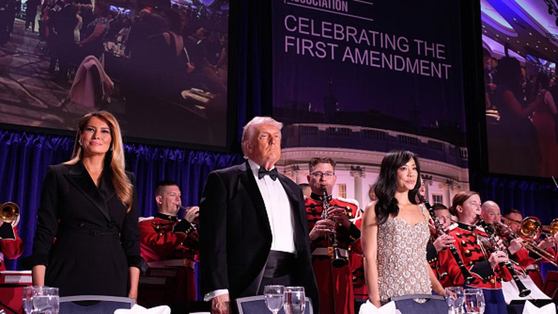 gettyimages-2272612710-594×594. US First Lady Melania Trump, from left, President Donald Trump, and Weijia Jiang, White House Correspondents' Association president and CBS Senior White House Correspondent, during the White House Correspondents' Association (WHCA) dinner in Washington, DC, US on Saturday, April 25, 2026. President Donald Trump and Vice President JD Vance were evacuated from the White House Correspondents' Association dinner event in Washington Saturday following a security incident at the venue. Photographer: Yuri Gripas/Abaca/Bloomberg via Getty Images