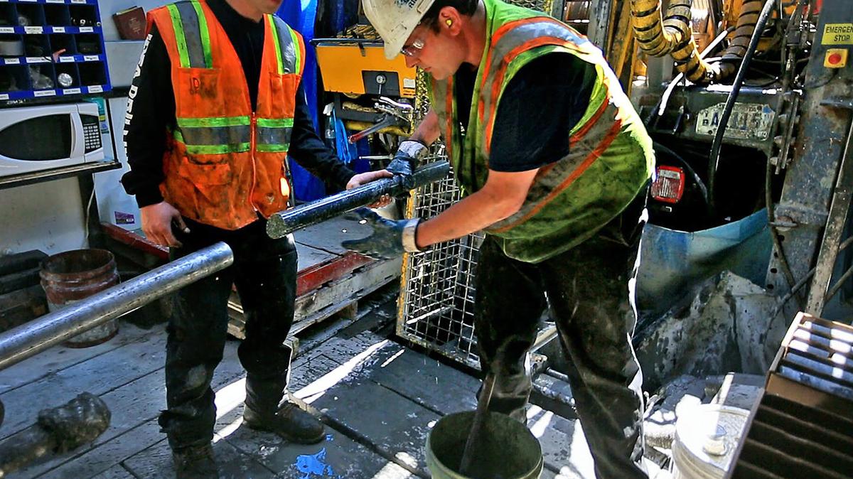 Drillers for Twin Metals Mining, at a site near the Kawishiwi River, pull a core sample from the drill pipe. There were pressure campaigns from both sides before recent Senate and House votes on allowing mineral leases in the Superior National Forest. (Brian Peterson/The Minnesota Star Tribune/TNS)