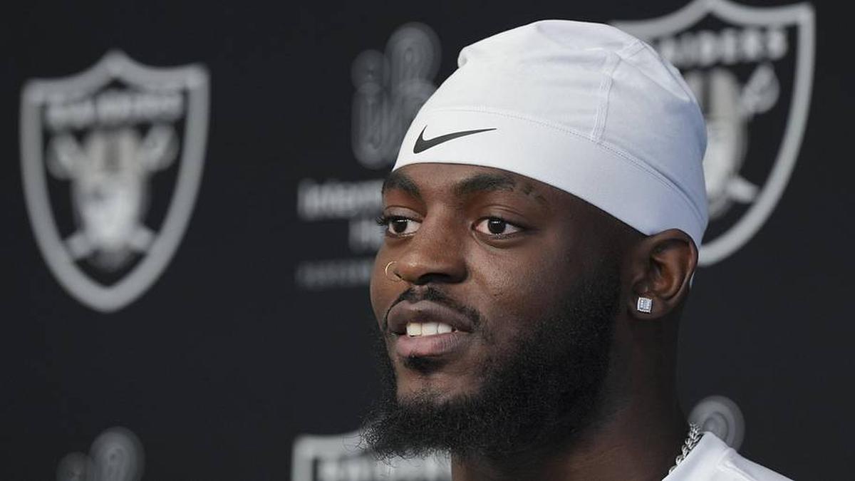  May 2, 2026; Henderson, NV, USA; Las Vegas Raiders defensive end Keyron Crawford (42) speaks during a news conference at the team's Rookie Minicamp at Intermountain Health Performance Center. Mandatory Credit: Candice Ward-Imagn Images | Candice Ward-Imagn Images 