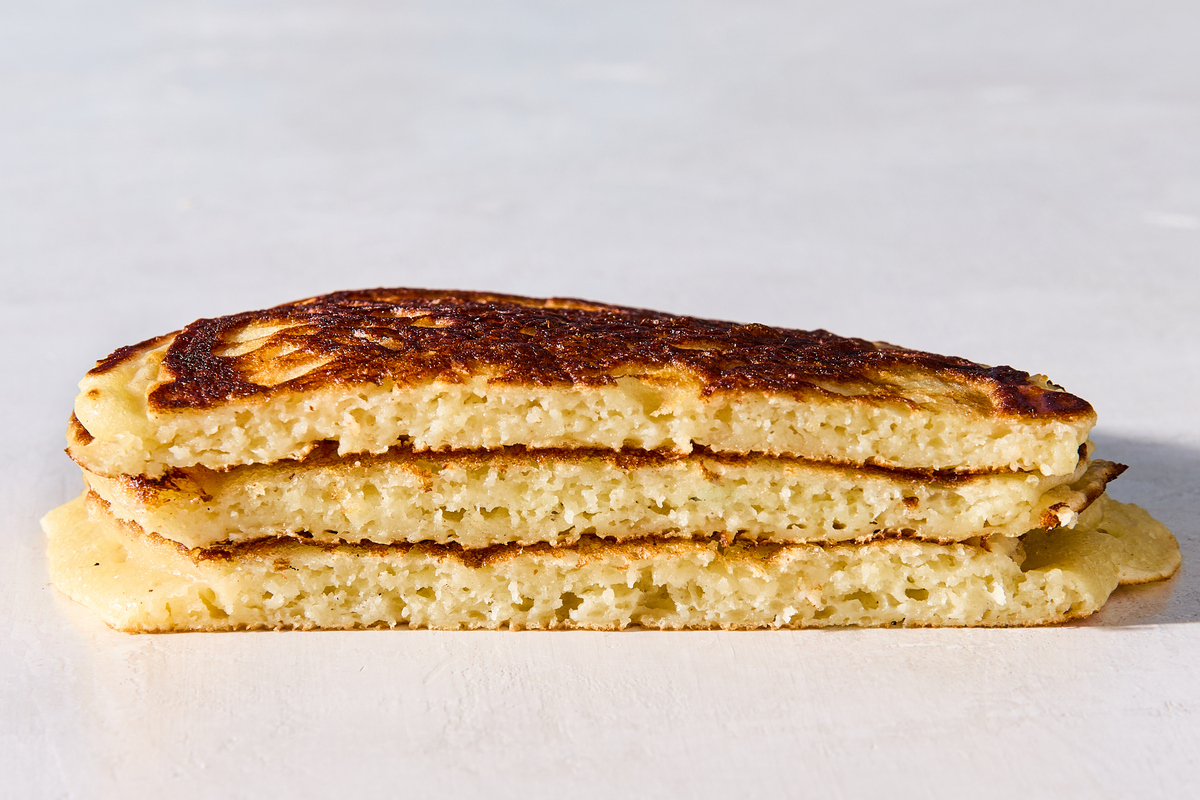 Buttermilk pancakes after letting the batter rest in the fridge for 48 hours. If you haven't let the batter rest, those first few pancakes will turn out too thin, with the batter running all over the pan. Food Stylist: Monica Pierini. (Julia Gartland/The New York Times)