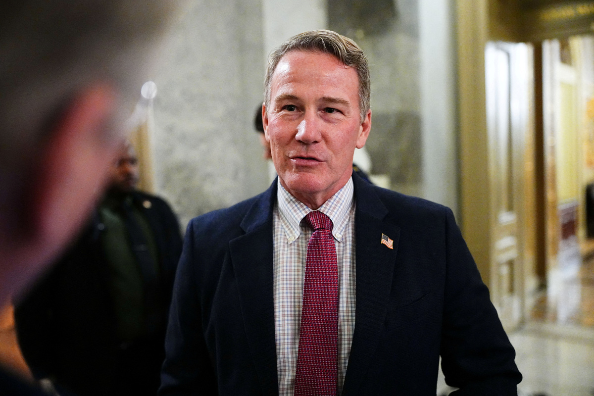 FILE PHOTO: U.S. Senator Jon Husted (R-OH) speaks with reporters outside the Senate Chamber on the 40th day of the partial government shutdown, in Washington, D.C., U.S., November 9, 2025. REUTERS/Aaron Schwartz/File Photo