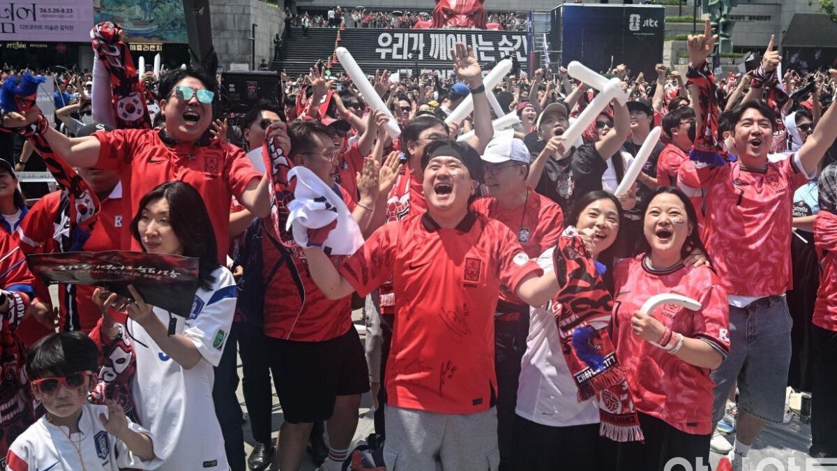 South Korean soccer fans cheer during a public viewing event at Gwanghwamun Square in Seoul on Friday as South Korea played Czechia in their Group A match at the 2026 FIFA World Cup. Photo by Asia Today