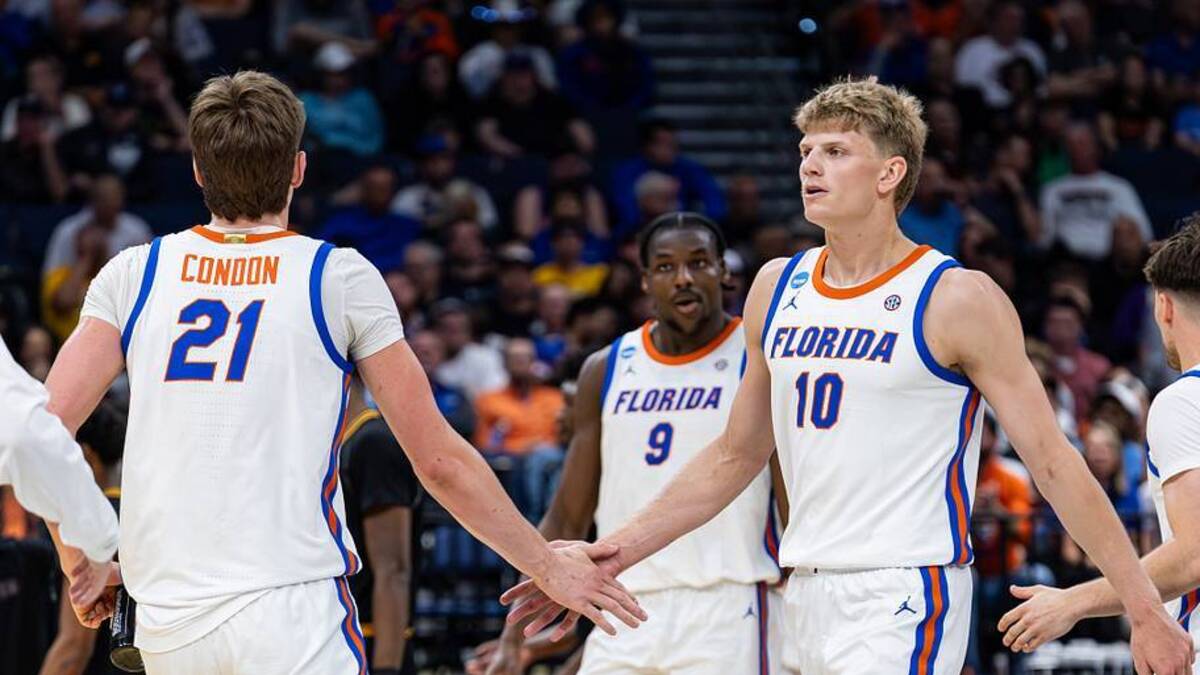  Florida forward Alex Condon (21), center Rueben Chinyelu (9) and forward Thomas Haugh (10) | Kyle Lander / Florida Gators on SI 