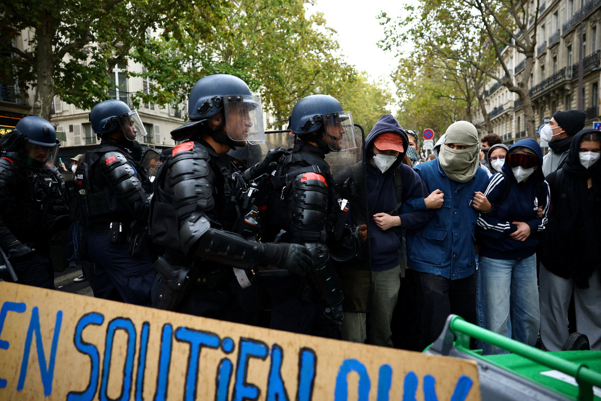 France suspends use of stun grenades to police student protests ...