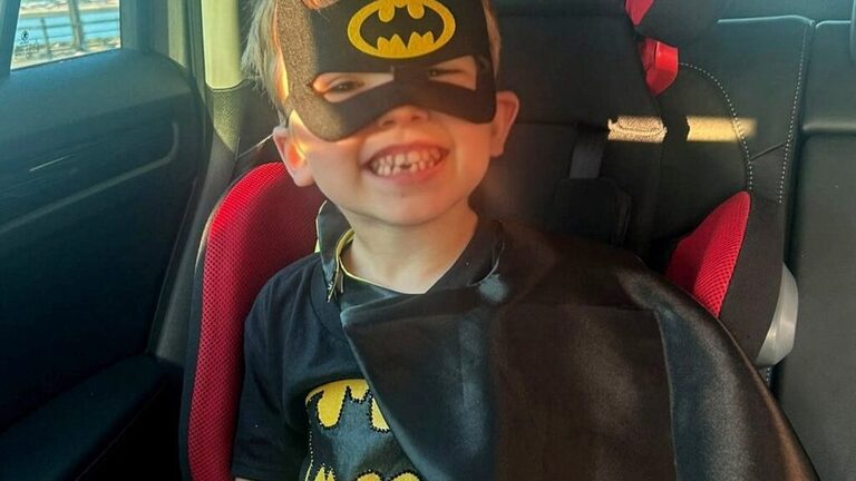 Boy dressed as Batman helps save man from drowning