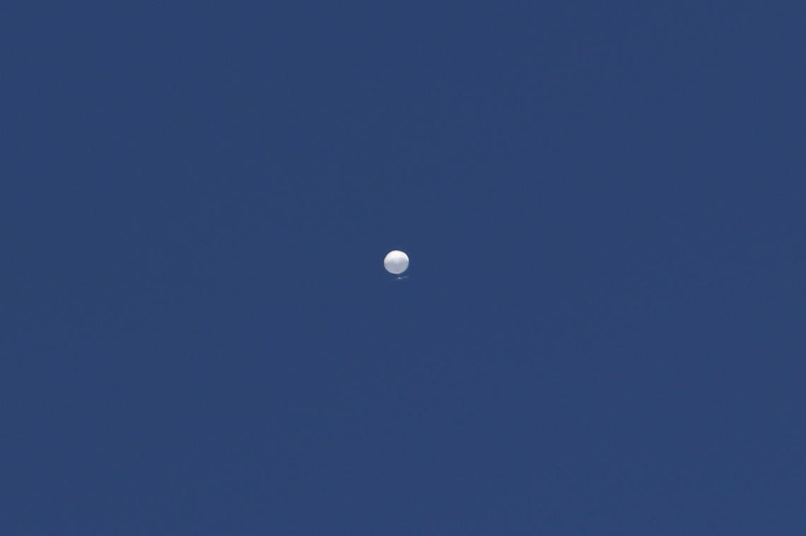 A balloon floats over Columbia, Mo., on Friday, Feb. 3, 2023. A huge, high-altitude Chinese balloon sailed across the U.S. on Friday, drawing severe Pentagon accusations of spying despite China’s firm denials.