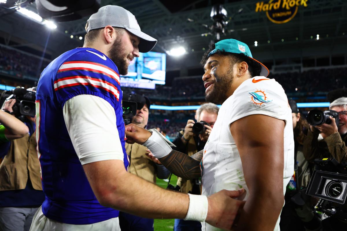 Bills vs Dolphins. MIAMI GARDENS, FLORIDA - JANUARY 07: Josh Allen #17 of the Buffalo Bills and Tua Tagovailoa #1 of the Miami Dolphins meet on the field after their game at Hard Rock Stadium on January 07, 2024 in Miami Gardens, Florida. The Bills and Dolphins play each other again this weekend.