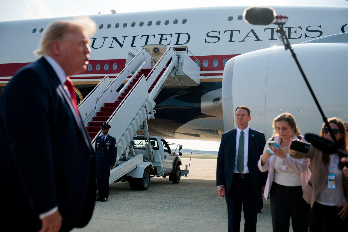 U.S. President Donald Trump speaks with reporters before boarding the new Air Force One, a plane gifted by the Qatari government, at Joint Base Andrews, Maryland, U.S., July 1, 2026. REUTERS/Evan Vucci