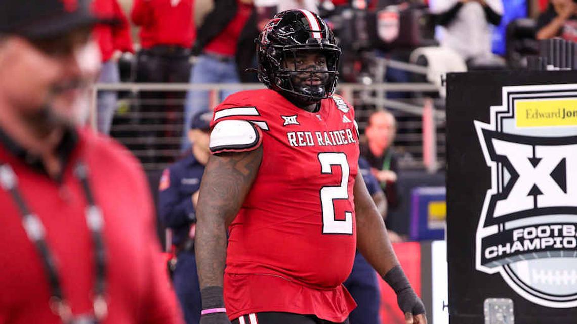  Texas Tech's Lee Hunter walks to the field before the Big 12 Conference championship football game, Saturday, Nov. 6, 2025, at AT&T Stadium in Arlington. | Nathan Giese/Avalanche-Journal / USA TODAY NETWORK via Imagn Images 