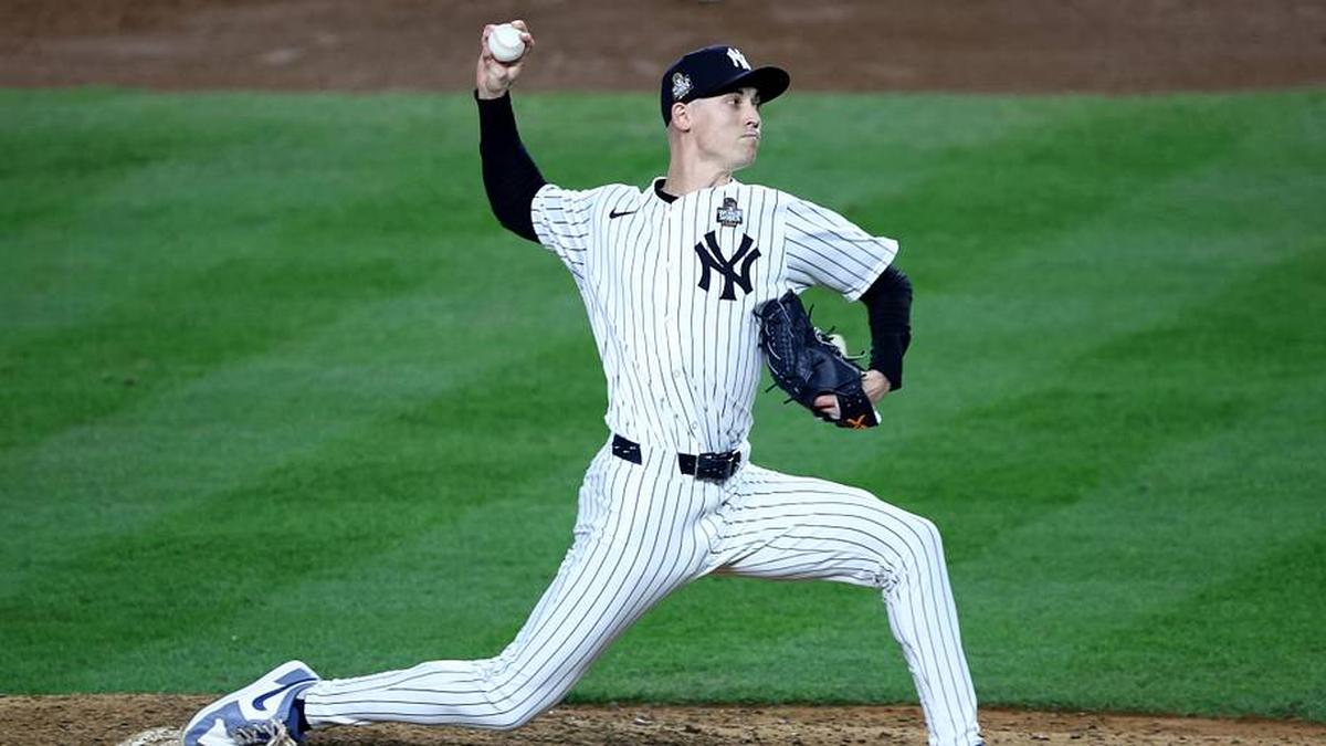 New York Yankees pitcher Luke Weaver (30) throws during the eighth inning against the Los Angeles Dodgers in game five of the 2024 MLB World Series at Yankee Stadium. | Wendell Cruz-Imagn Images 