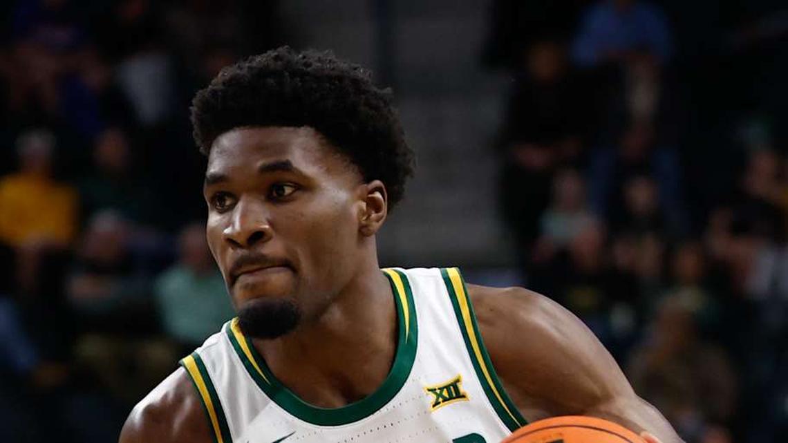  Feb 24, 2026; Waco, Texas, USA; Baylor Bears guard Tounde Yessoufou (24) drives to the basket against Arizona Wildcats forward Tobe Awaka (30) during the first half at Paul and Alejandra Foster Pavilion. Mandatory Credit: Chris Jones-Imagn Images | Chris Jones-Imagn Images 