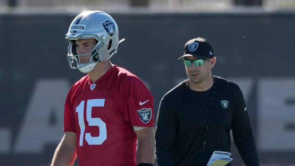  Jun 9, 2026; Henderson, NV, USA; Las Vegas Raiders quarterback Fernando Mendoza (15) and coach Klint Kubiak during minicamp at Intermountain Health Performance Center. Mandatory Credit: Kirby Lee-Imagn Images | Kirby Lee-Imagn Images 
