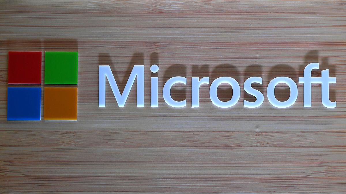 The logo of Microsoft is pictured during the launch of Surface Book 2 and Surface Laptop at a promotional event in New Delhi on Aug. 7, 2018. (Sajjad Hussain/AFP/Getty Images/TNS)