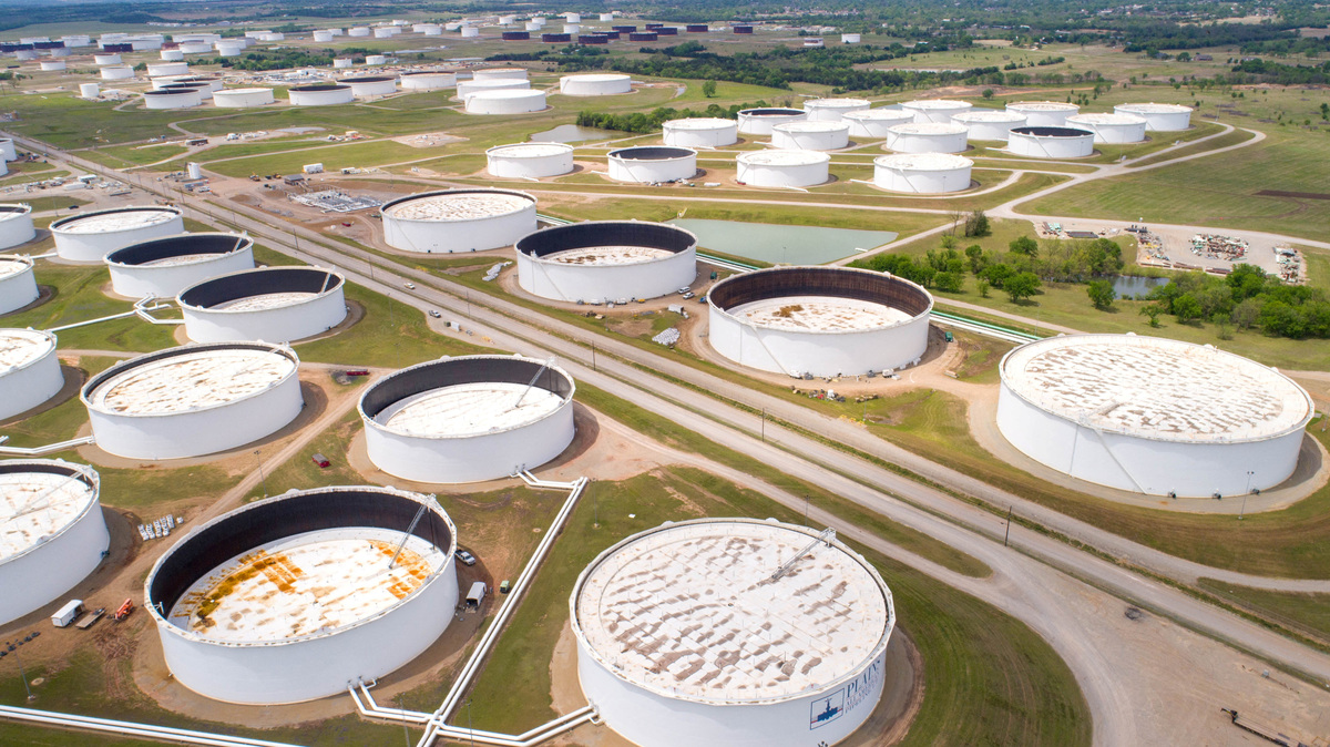 FILE PHOTO: Crude oil storage tanks are seen in an aerial photograph at the Cushing oil hub in Cushing, Oklahoma, U.S. April 21, 2020. REUTERS/Drone Base/File Photo