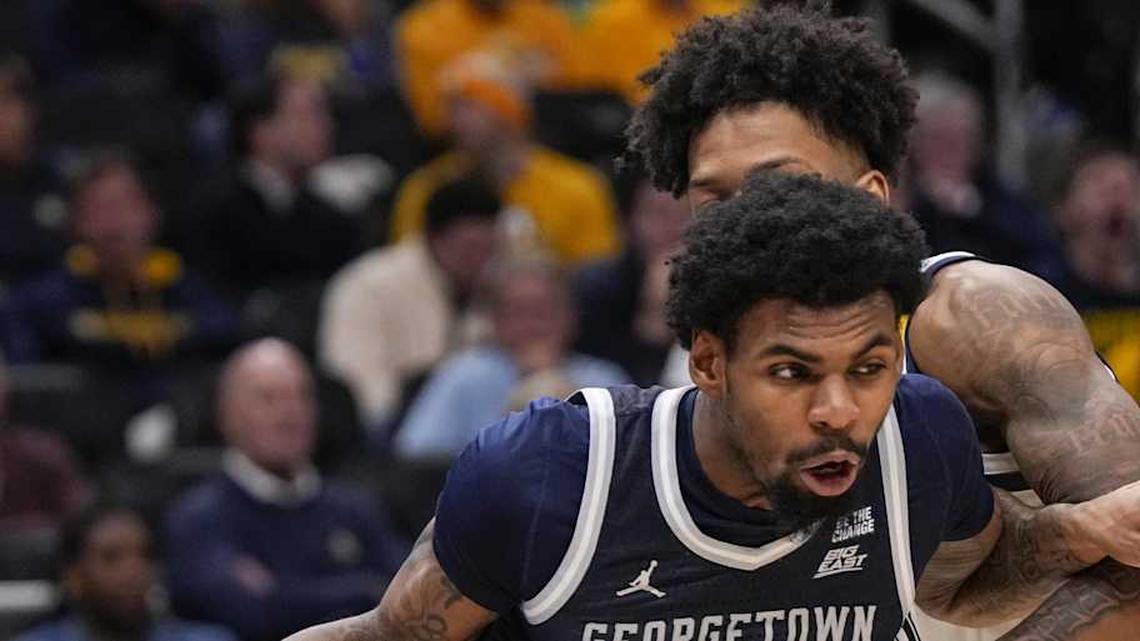  Dec 17, 2025; Milwaukee, Wisconsin, USA; Georgetown Hoyas guard KJ Lewis (5) drives for the basket during the first half against the Marquette Golden Eagles at Fiserv Forum. Mandatory Credit: Jeff Hanisch-Imagn Images | Jeff Hanisch-Imagn Images 