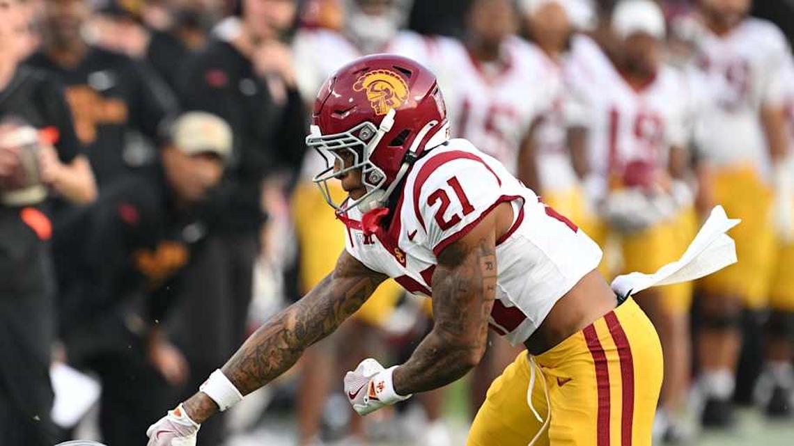  Sep 13, 2025; West Lafayette, Indiana, USA; Purdue Boilermakers wide receiver Corey Smith (12) reaches for a ball in front of USC Trojans cornerback Chasen Johnson (21) during the first quarter at Ross-Ade Stadium. Mandatory Credit: Marc Lebryk-Imagn Images | Marc Lebryk-Imagn Images 