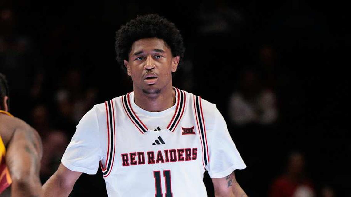  Mar 12, 2026; Kansas City, MO, USA; Texas Tech Red Raiders guard Jaylen Petty (11) brings the ball up court around Iowa State Cyclones guard Jamarion Batemon (1) during the first half at T-Mobile Center. Mandatory Credit: William Purnell-Imagn Images | William Purnell-Imagn Images 