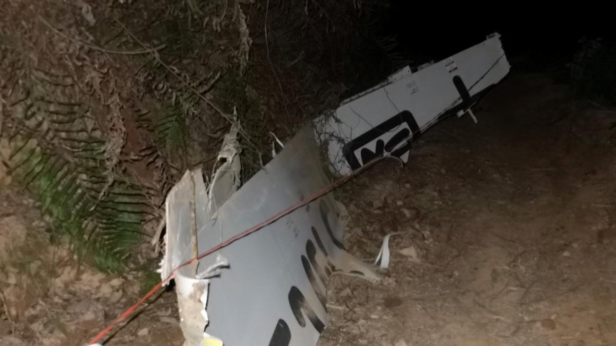 Plane debris is seen at the site where a China Eastern Airlines Boeing 737-800 plane flying from Kunming to Guangzhou crashed, in Wuzhou, Guangxi Zhuang Autonomous Region, China March 21, 2022. Picture taken March 21, 2022. cnsphoto via REUTERS