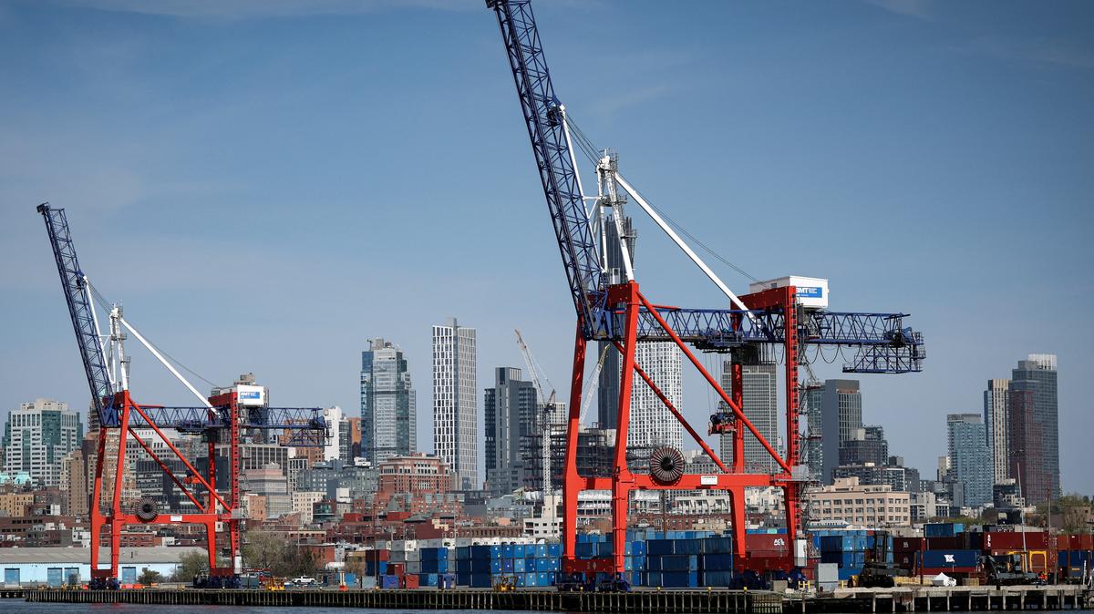 Shipping containers are stacked on a pier at the Red Hook Terminal in Brooklyn, New York City, U.S., April 14, 2026. REUTERS/Brendan McDermid
