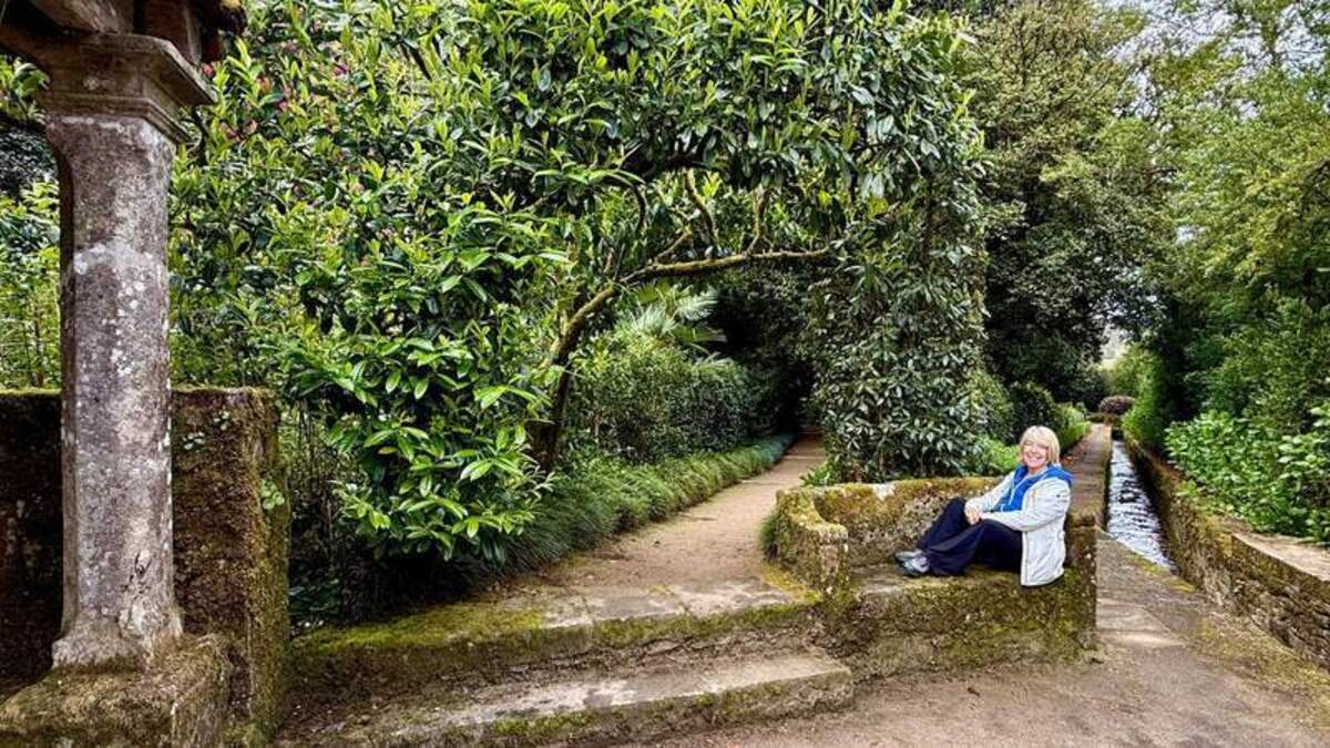  Taking a quick rest break in the gorgeous Pazo de Oca. Photo credit: photo of writer Margot Black by Kerrick James 
