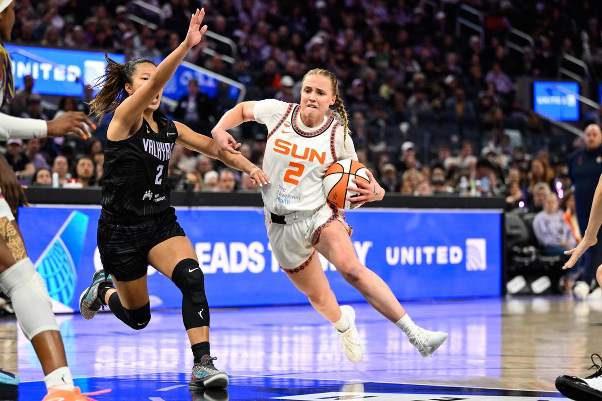  May 25, 2026; San Francisco, California, USA; Connecticut Sun guard Hailey Van Lith (2) dribbles against Golden State Valkyries guard Kaitlyn Chen (2) in the third quarter at Chase Center. Mandatory Credit: Eakin Howard-Imagn Images 