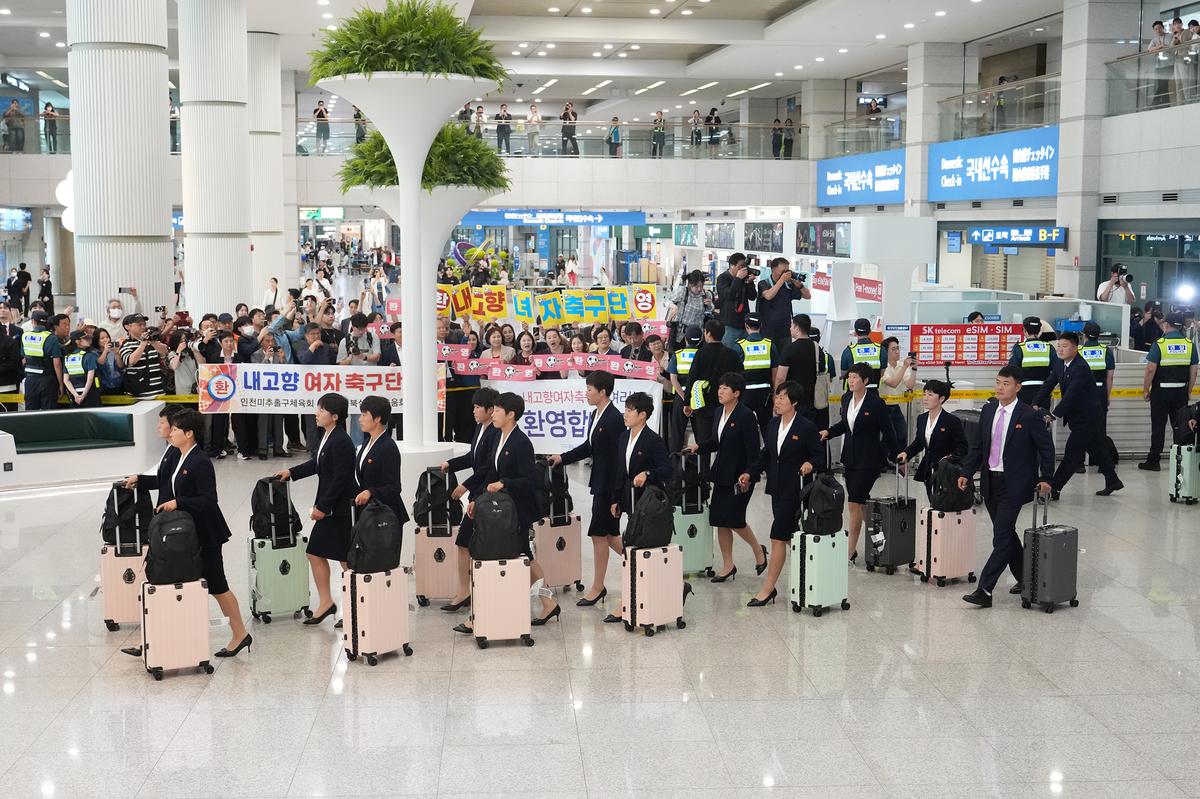 Members of Naegohyang, a North Korean women's soccer team, arriving at Incheon International Airport in South Korea on Sunday, May 17, 2026. The team's trip, for a women's soccer tournament, is unlikely to catalyze a diplomatic thaw between the two Koreas, although some sports events have. (Chang W. Lee/The New York Times)