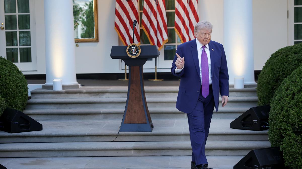 U.S. President Donald Trump acknowledges applause from his guests after delivering remarks at a 'Rose Garden Club' dinner for National Police Week in the Rose Garden at the White House on May 11, 2026, in Washington, D.C. Trump hosted leaders of various law enforcement organizations in honor of officers fallen in the line of duty. (Kevin Dietsch/Getty Images/TNS)