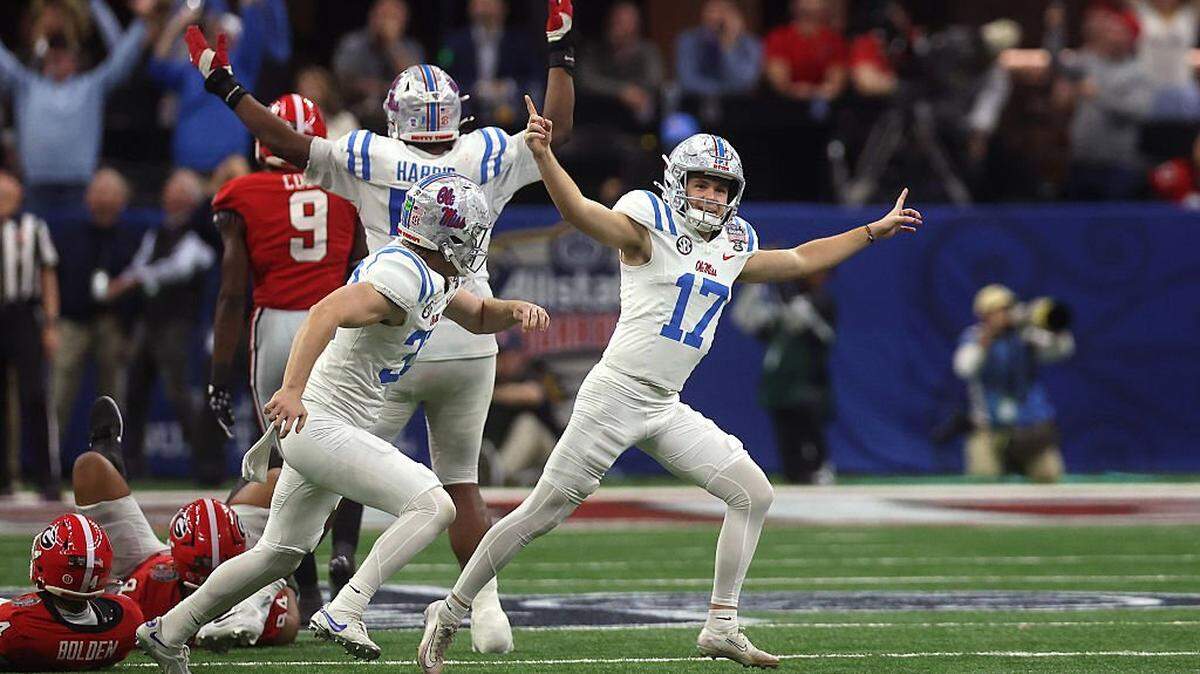 Lucas Carneiro celebrates after kicking the game-winning field goal in Ole Miss’ victory Thursday over Georgia.