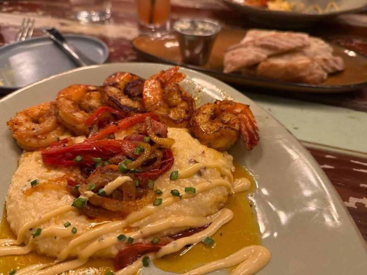  Classic shrimp and grits at Common Restaurant, a signature dish of Lowcountry cuisine. Photo credit: Sharon Kurtz 