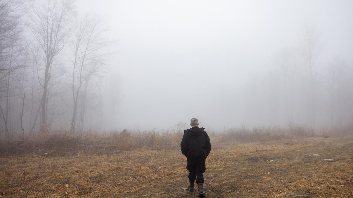 Michael Hopmeier, a weapons and security contractor on his land in the Adirondacks, where he has been trying for five years to get approval for a firing range, roughly the length of two football fields, that can accommodate a howitzer, in Lewis, N.Y., April 15. In the Adirondack Mountains of northern New York, many local residents are weary of military activities near an old missile silo and wary of the prospect of a howitzer range.