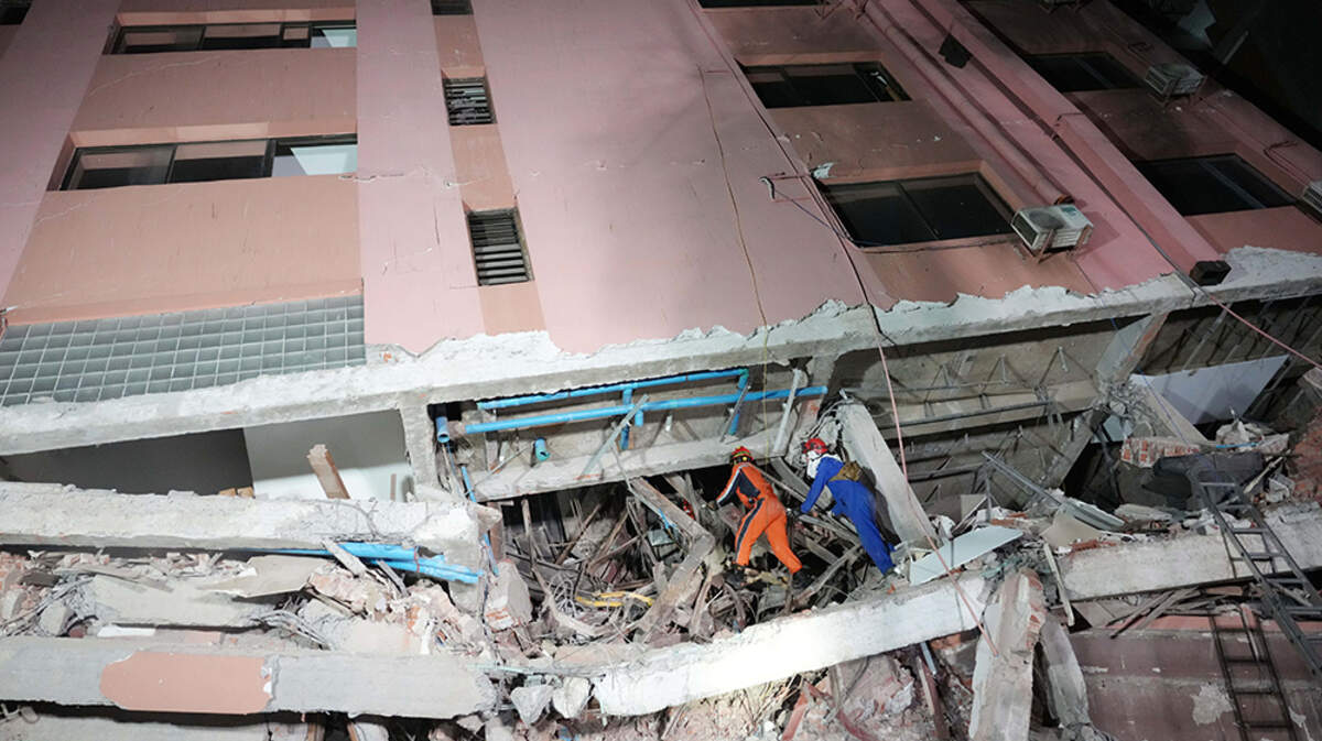 A member of the China search and rescue team conducts rescue work with local crews looking for victims of Friday’s deadly earthquake in Mandalay, Myanmar, on Sunday, March 30, 2025.