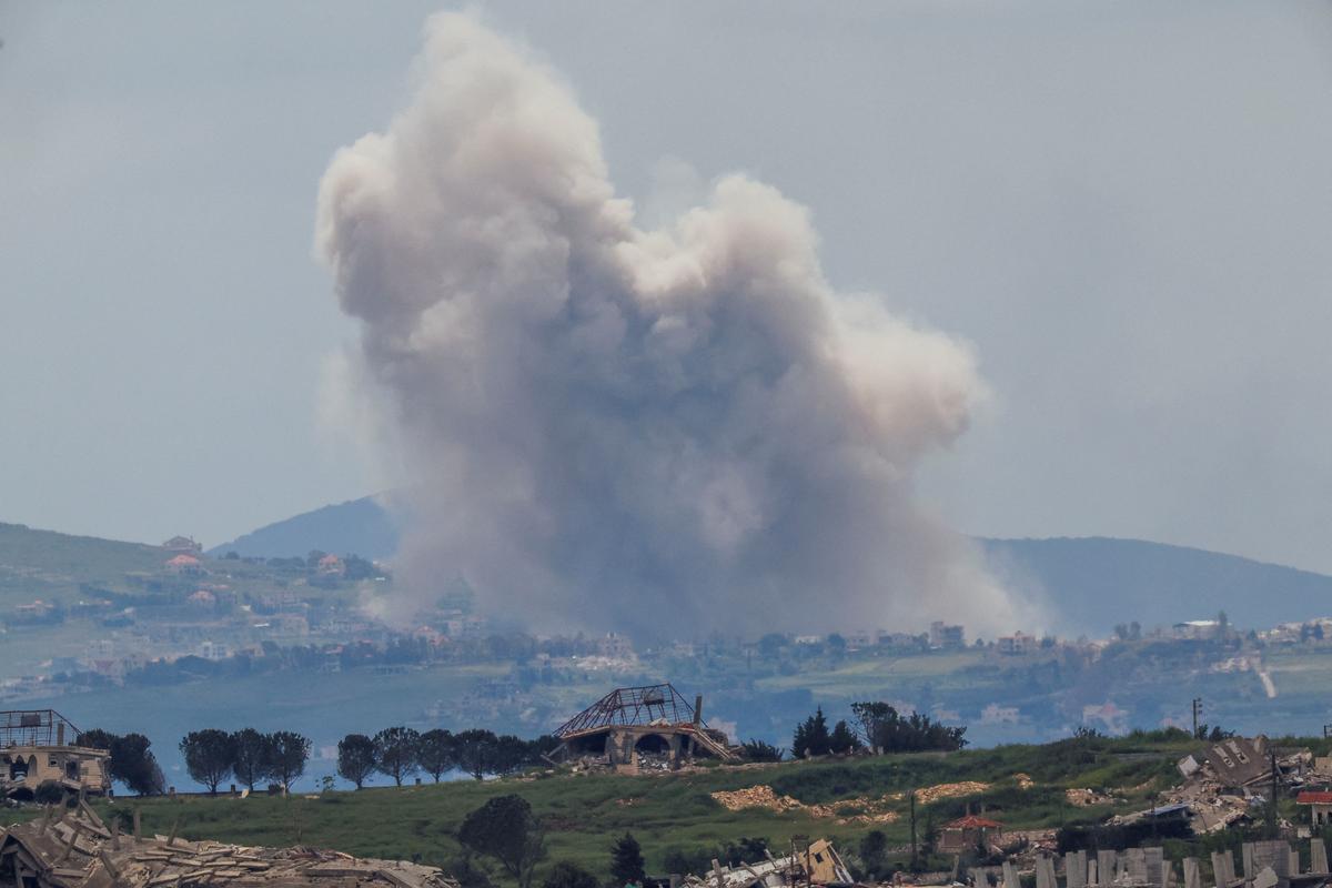 Smoke rises from southern Lebanon, as seen from the Israeli side of the Israel-Lebanon border, in northern Israel, May 6, 2026. REUTERS/Ammar Awad