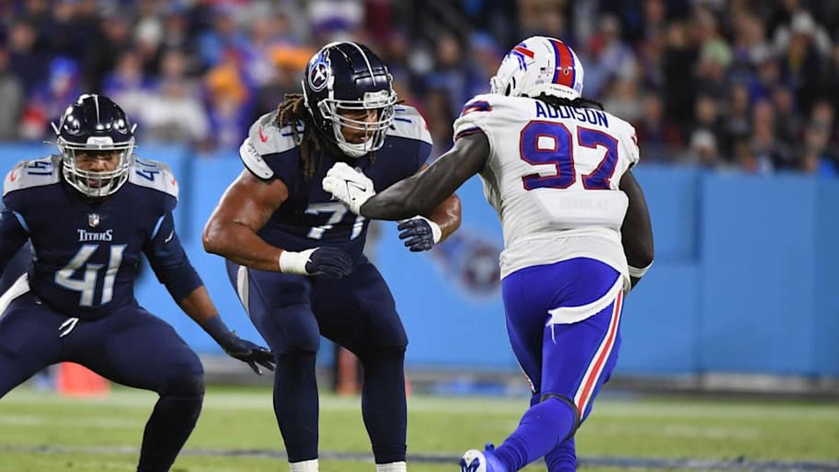  Oct 18, 2021; Nashville, Tennessee, USA; Tennessee Titans offensive tackle Kendall Lamm (71) works against Buffalo Bills defensive end Mario Addison (97) during the second half at Nissan Stadium. Mandatory Credit: Christopher Hanewinckel-Imagn Images | Christopher Hanewinckel-Imagn Images 