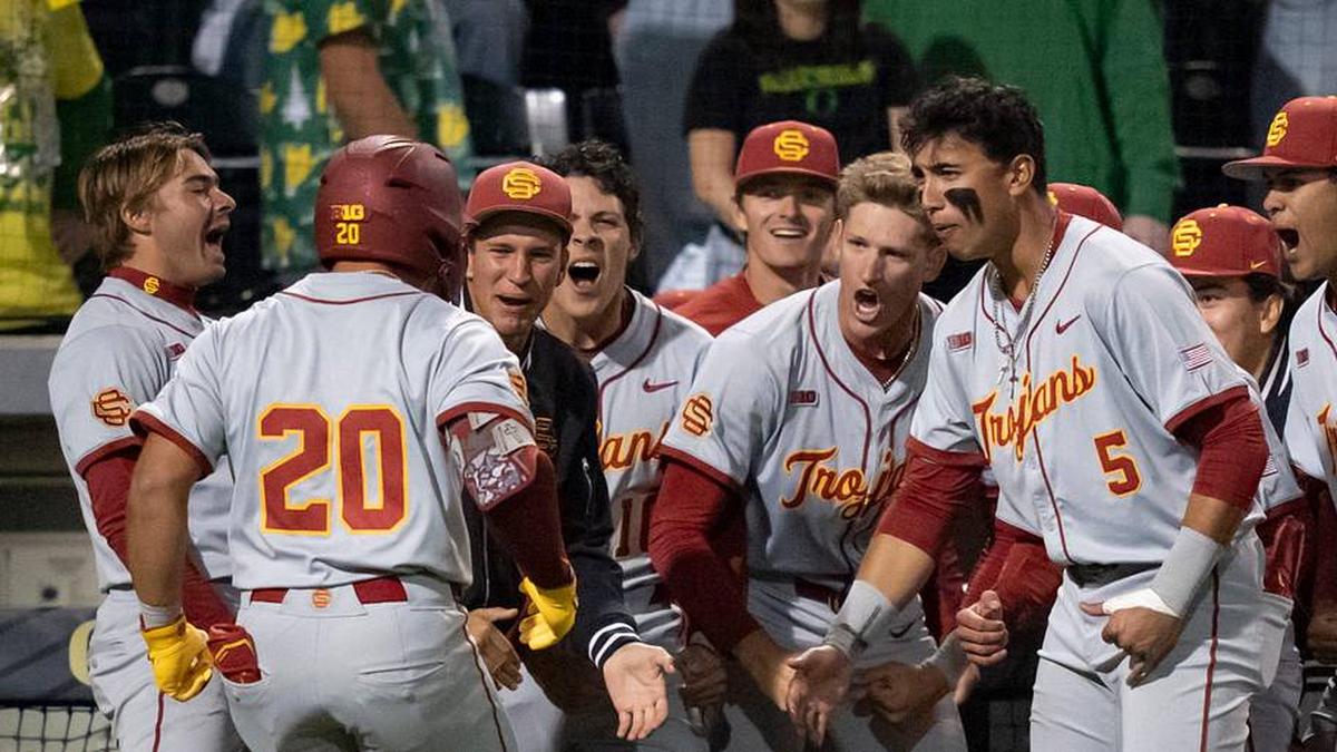  USC celebrates a home run by Isaac Cadena (20) as the Oregon Ducks host the USC Trojans on May 14, 2026, in Eugene, Oregon. | Ben Lonergan/The Register-Guard / USA TODAY NETWORK via Imagn Images 
