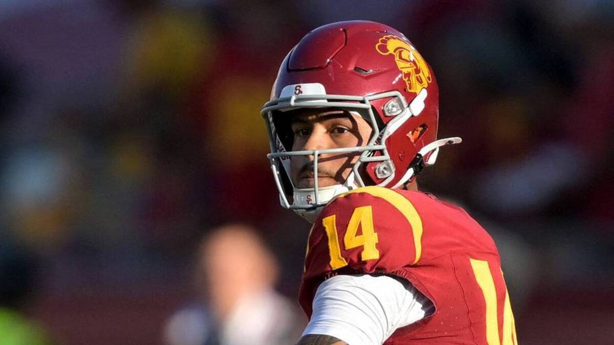  Oct 11, 2025; Los Angeles, California, USA; USC Trojans quarterback Jayden Maiava (14) throws a pass in the first half against the Michigan Wolverines at United Airlines Field at the Los Angeles Memorial Coliseum. Mandatory Credit: Jayne Kamin-Oncea-Imagn Images | IMAGN IMAGES via Reuters Connect 