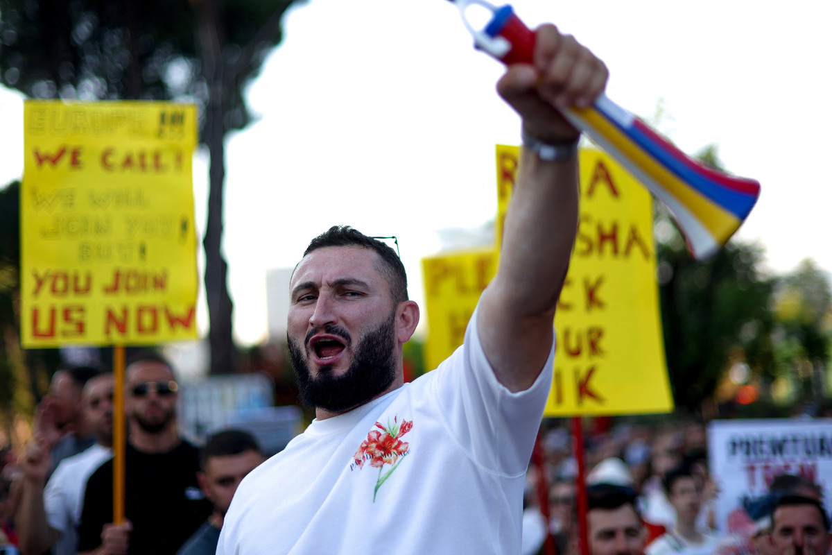 Protesters take part in a protest against a luxury resort, a plan by a company linked to U.S. President Donald Trump's son-in-law, Jared Kushner, on an environmentally sensitive part of the Adriatic coast, in Tirana, Albania, June 9, 2026. REUTERS/Florion Goga